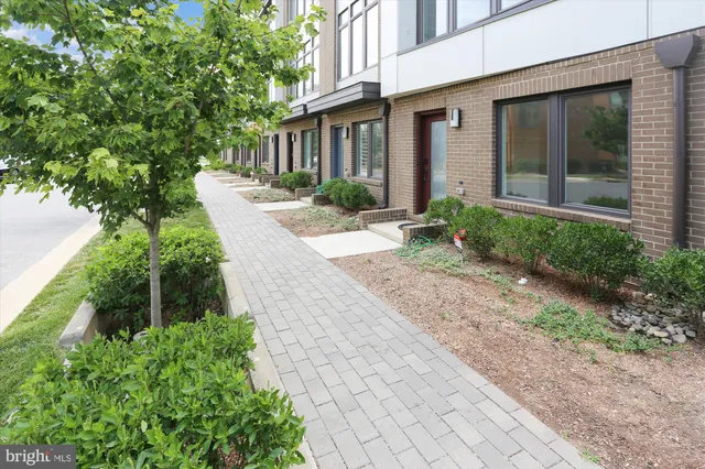 a view of a balcony with wooden floor
