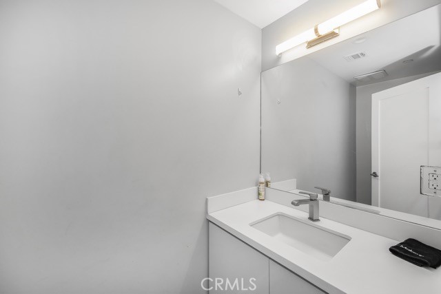 4240 Barrett Road Los Angeles, CA 90032 - Photo 21 of 47 a bathroom with a sink and a mirror