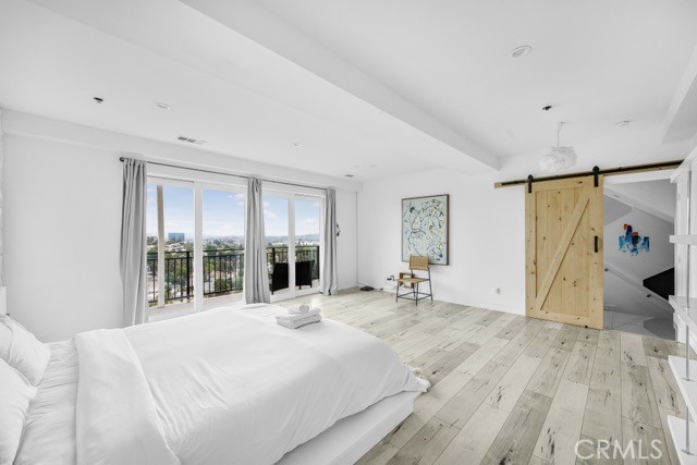 4240 Barrett Road Los Angeles, CA 90032 - Photo 29 of 47 a large white bed in a white room
