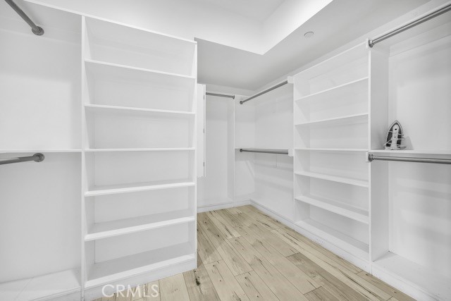 4240 Barrett Road Los Angeles, CA 90032 - Photo 30 of 47 a view of walk in closet with empty racks