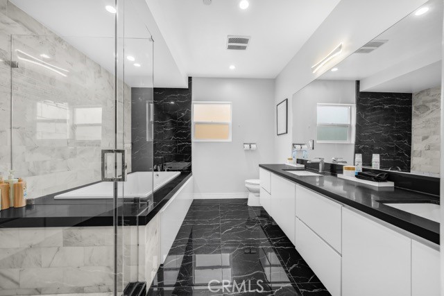 4240 Barrett Road Los Angeles, CA 90032 - Photo 32 of 47 a large kitchen with granite countertop a sink and a large window