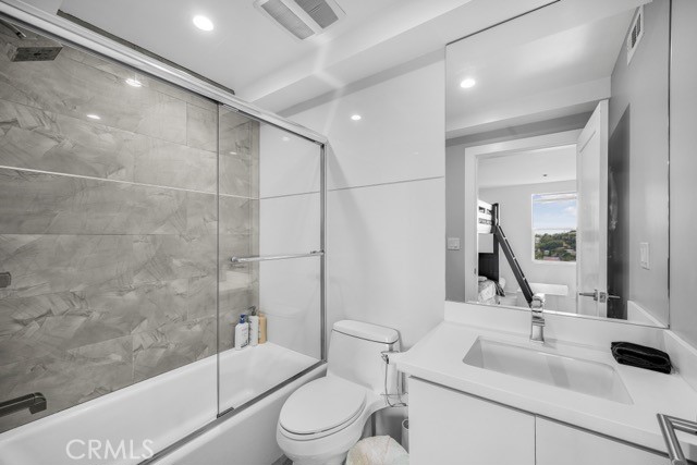 4240 Barrett Road Los Angeles, CA 90032 - Photo 36 of 47 a bathroom with a sink a toilet and shower