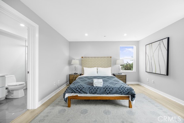 4240 Barrett Road Los Angeles, CA 90032 - Photo 39 of 47 a bedroom with a bed and painting on the wall