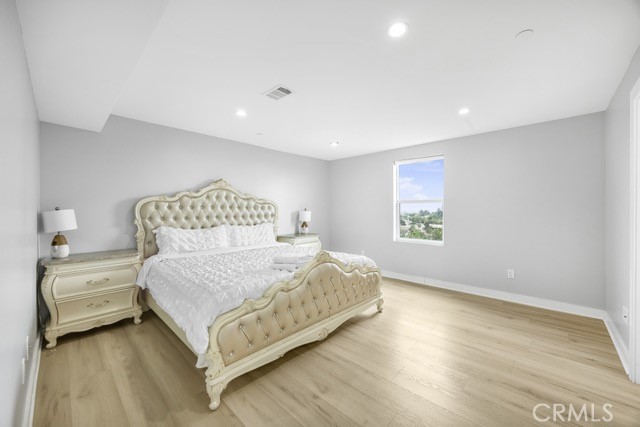 4240 Barrett Road Los Angeles, CA 90032 - Photo 40 of 47 a bedroom with a bed and window