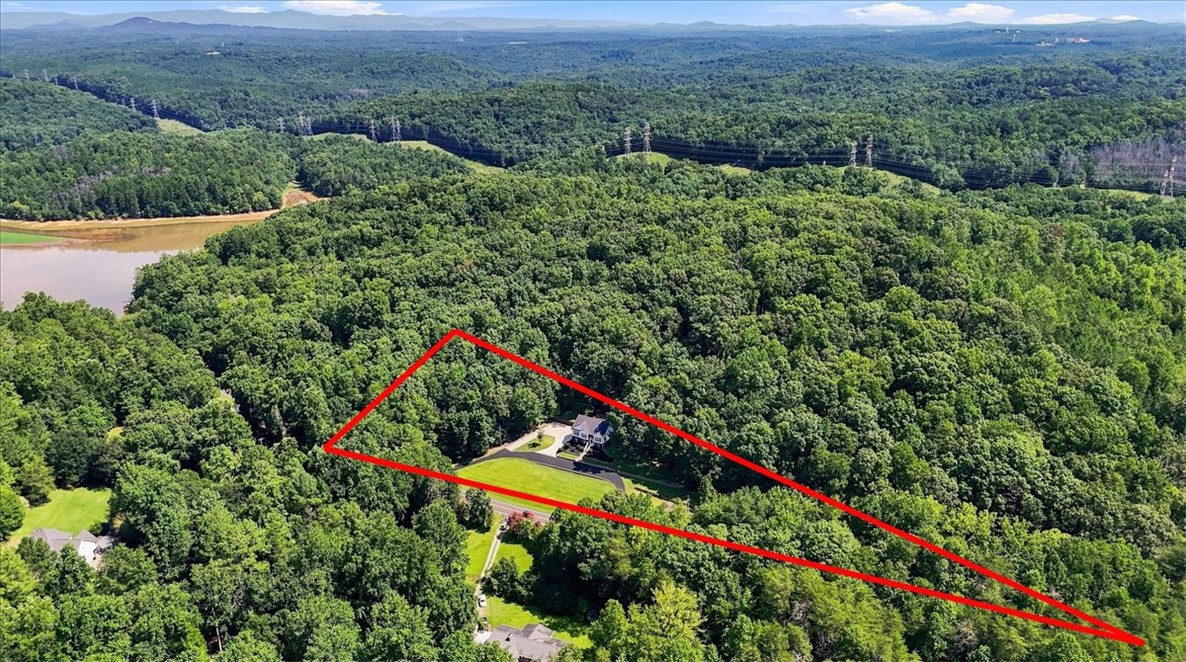 1052 Madden Bridge Road Central, SC 29630 - Photo 50 of 50 Lush rolling hills and dense woodlands surround this private mountain-view estate.