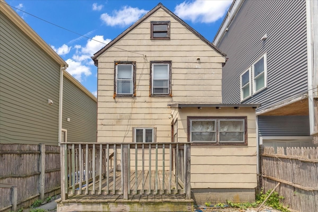 4 Springer Street Boston, MA 02127 - Photo 13 of 18 a view of a house with a balcony