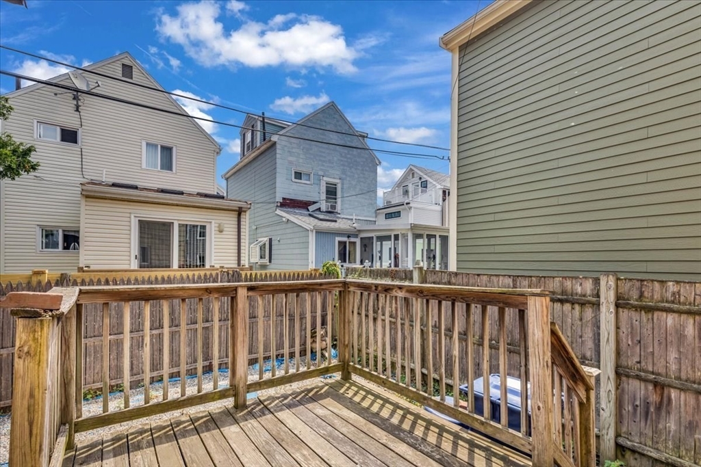 4 Springer Street Boston, MA 02127 - Photo 14 of 18 a view of a brick building from a balcony