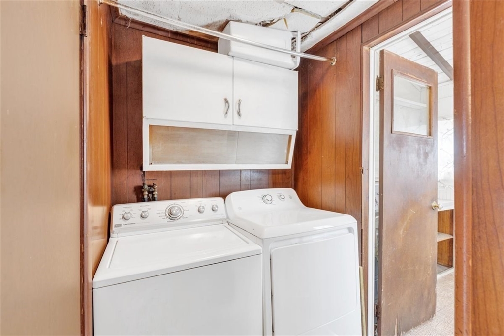 4 Springer Street Boston, MA 02127 - Photo 6 of 18 a utility room with dryer and washer