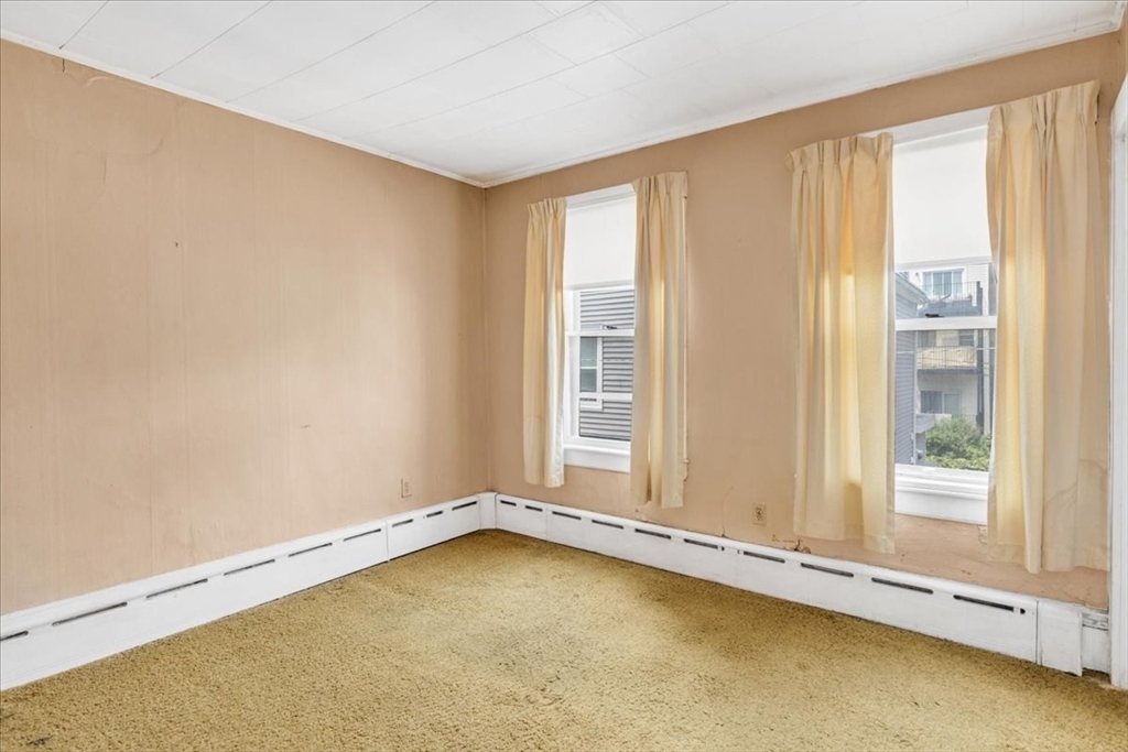 4 Springer Street Boston, MA 02127 - Photo 10 of 18 an empty room with a window