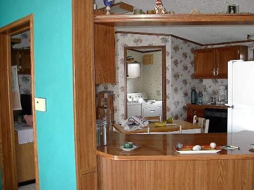 746 Moffet Road Paw Paw, IL 61353 - Photo 6 of 8 a view of sink with washer and dryer