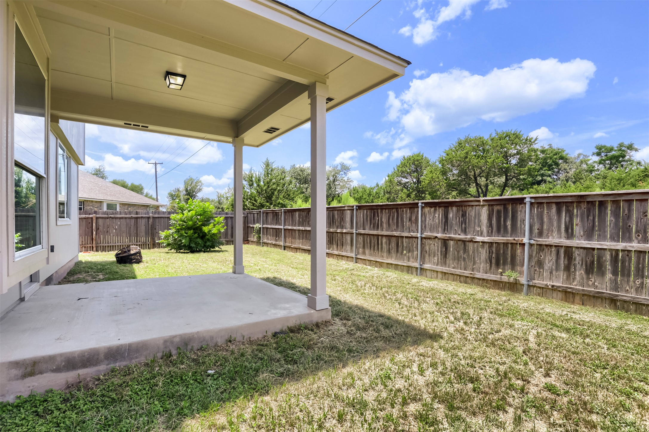 4125 Pebble Ridge Cove Round Rock, TX 78681 - Photo 27 of 30 A spacious covered patio offers a refreshing outdoor retreat.