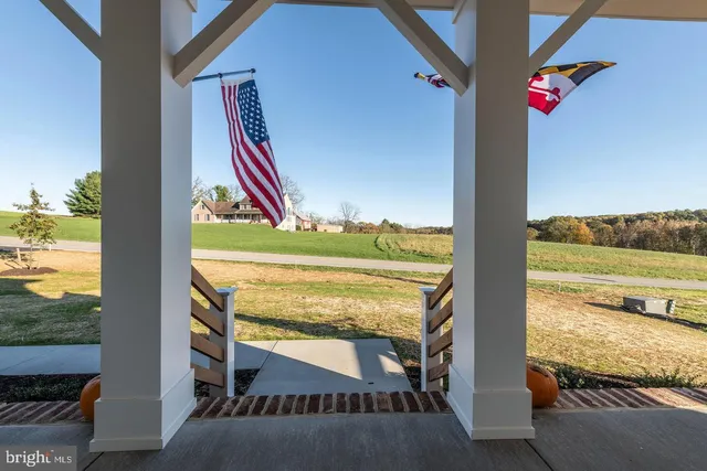 a view of a balcony with an ocean view