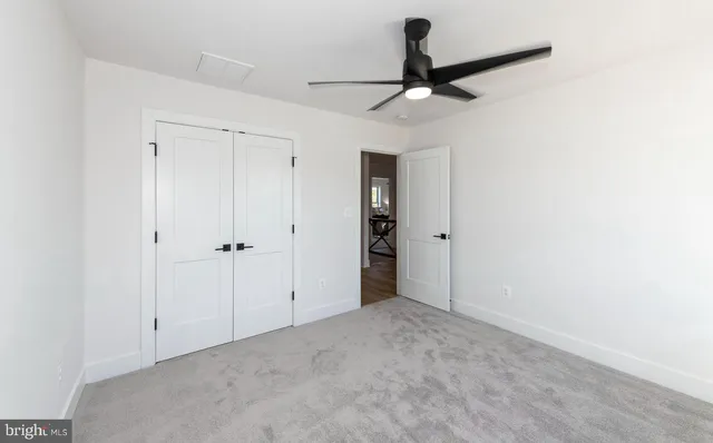 a view of pool with yard