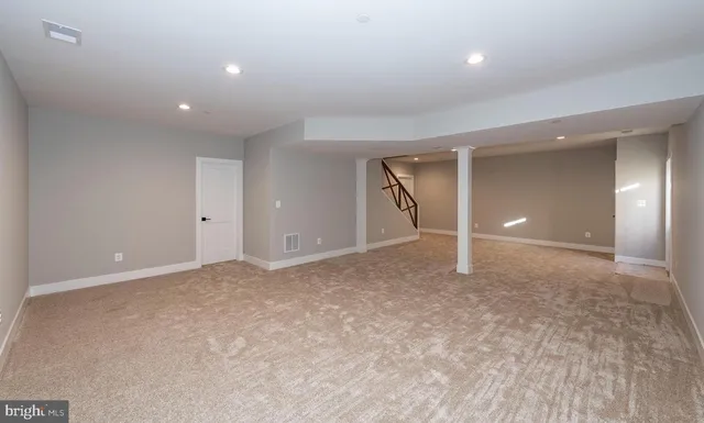 a view of a balcony and a floor to ceiling window