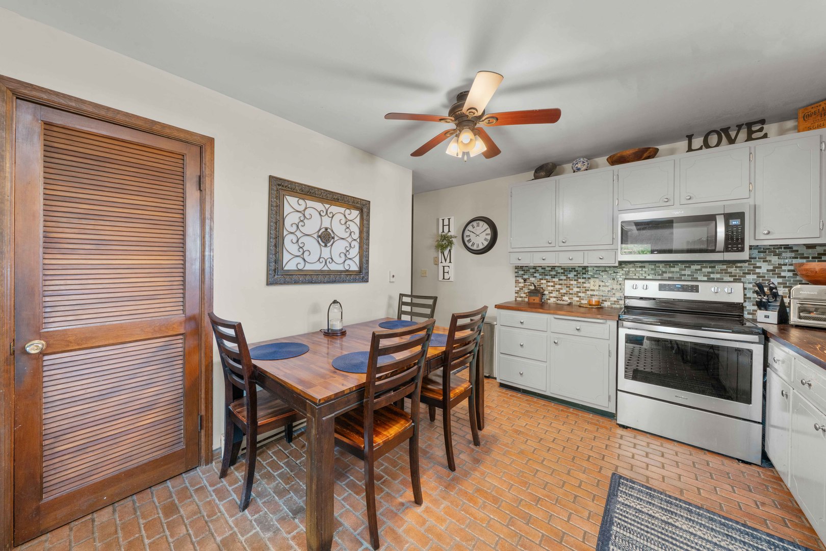 10266 Pritchard Road Hinckley, IL 60520 - Photo 11 of 41 a kitchen with a dining table and chairs