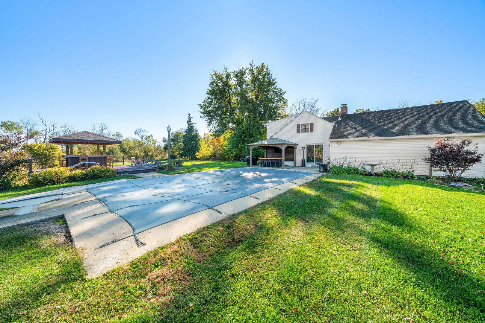 10266 Pritchard Road Hinckley, IL 60520 - Photo 26 of 41 a front view of a house with garden