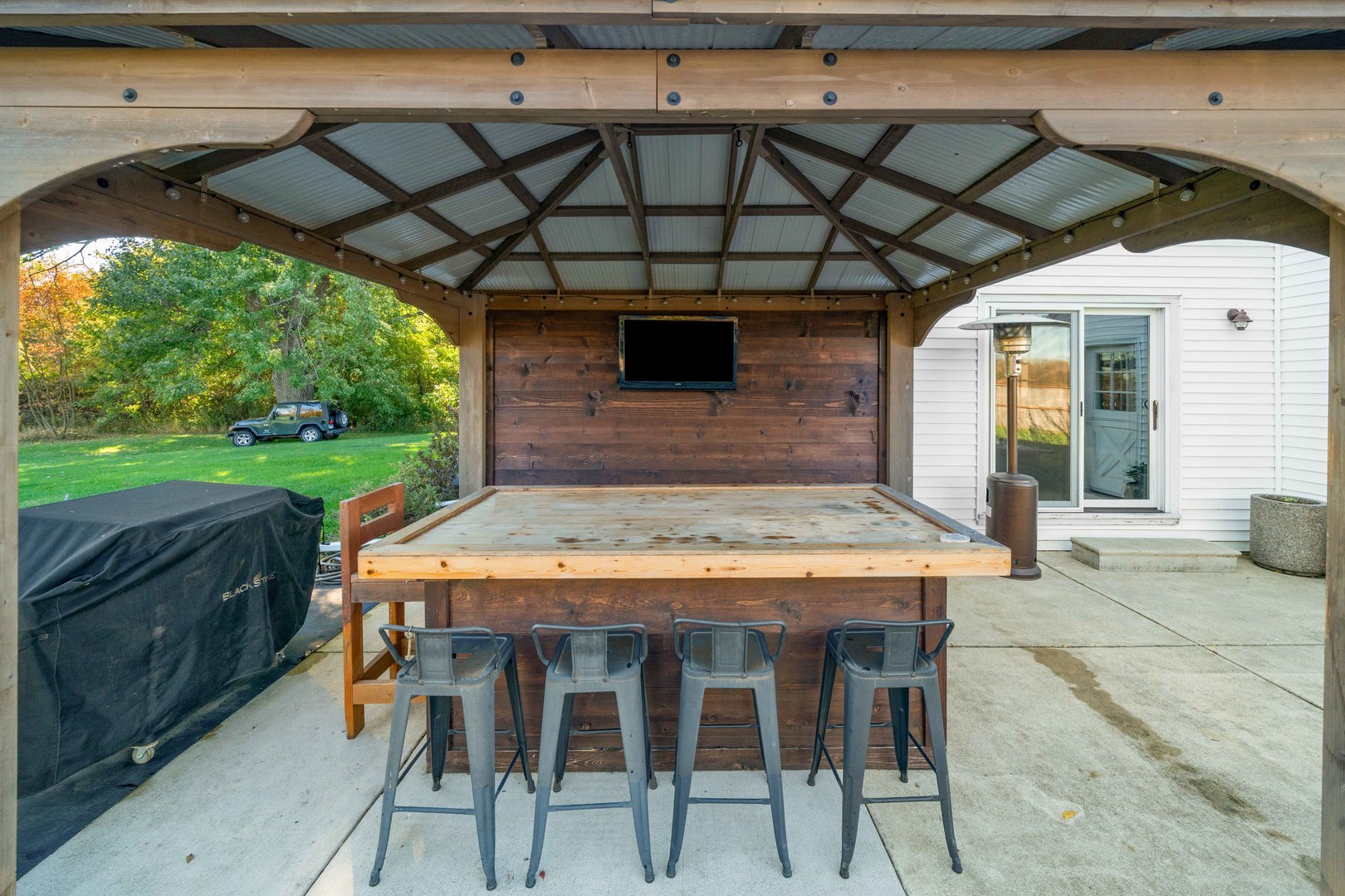 10266 Pritchard Road Hinckley, IL 60520 - Photo 36 of 41 a patio with a table and chairs