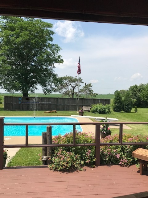 10266 Pritchard Road Hinckley, IL 60520 - Photo 41 of 41 a view of a lake with a yard