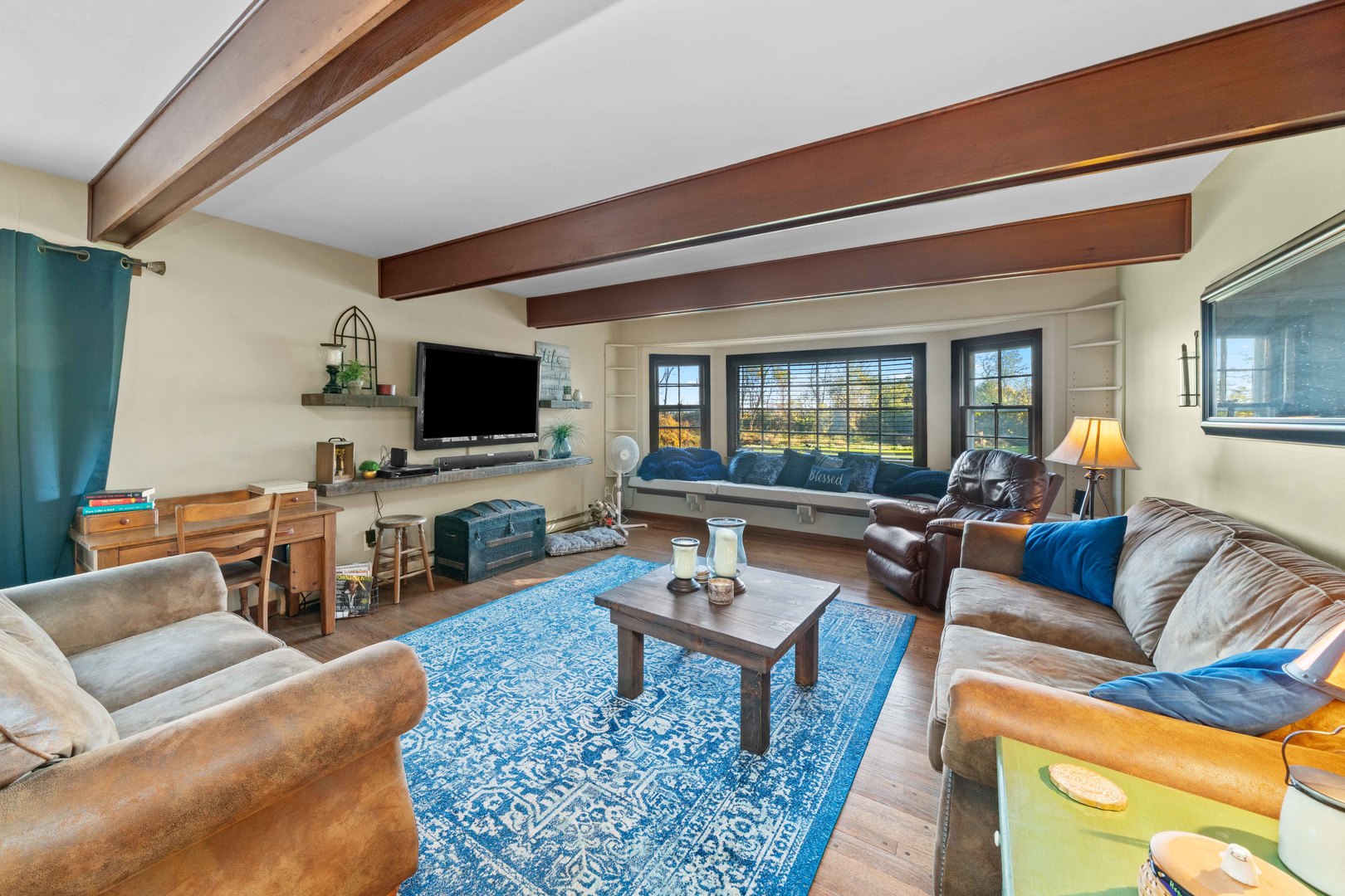 10266 Pritchard Road Hinckley, IL 60520 - Photo 5 of 41 a living room with furniture and a flat screen tv