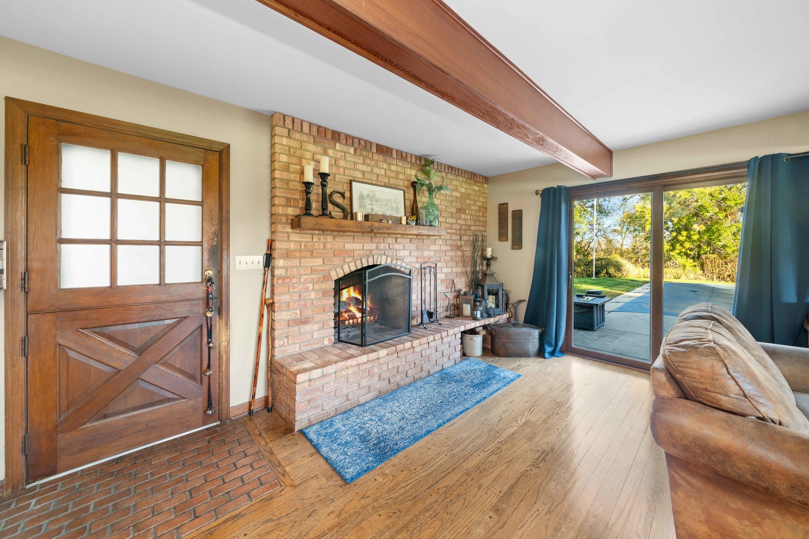 10266 Pritchard Road Hinckley, IL 60520 - Photo 8 of 41 a living room with furniture and a fireplace
