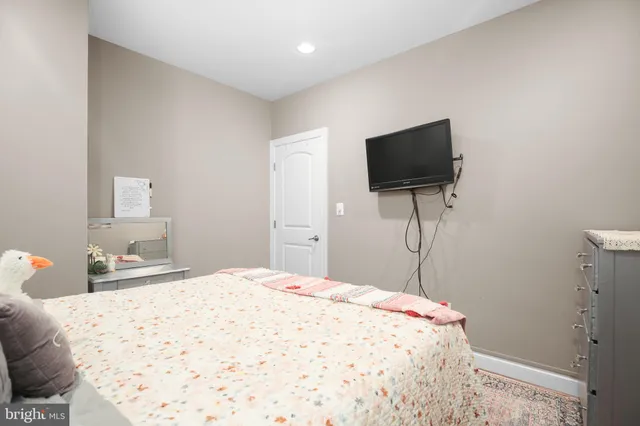 a view of a chair and tables in the backyard