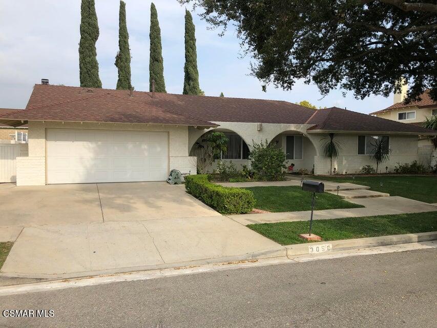 a view of house with outdoor space