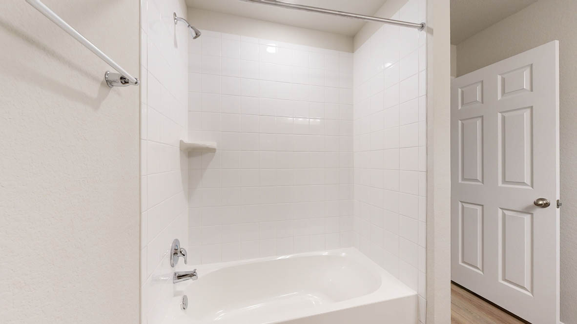 405 Creekfall Road Burnet, TX 78611 - Photo 25 of 27 Full bathroom with shower / tub combination and light wood-type flooring