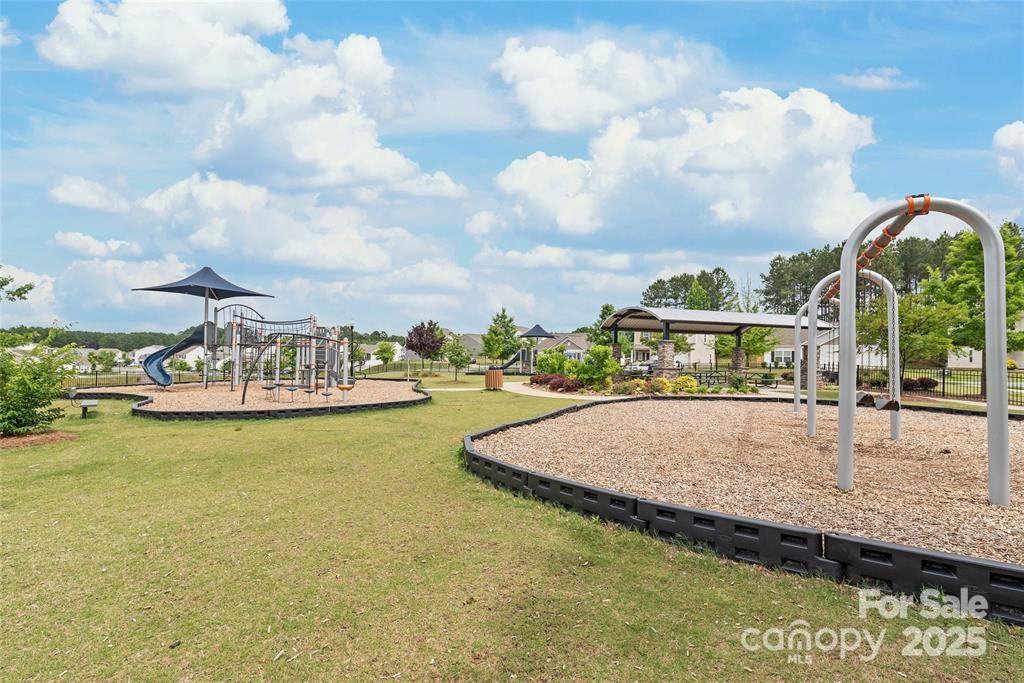 9740 Weikert Road Charlotte, NC 28215 - Photo 14 of 16 a view of a swimming pool with a terrace