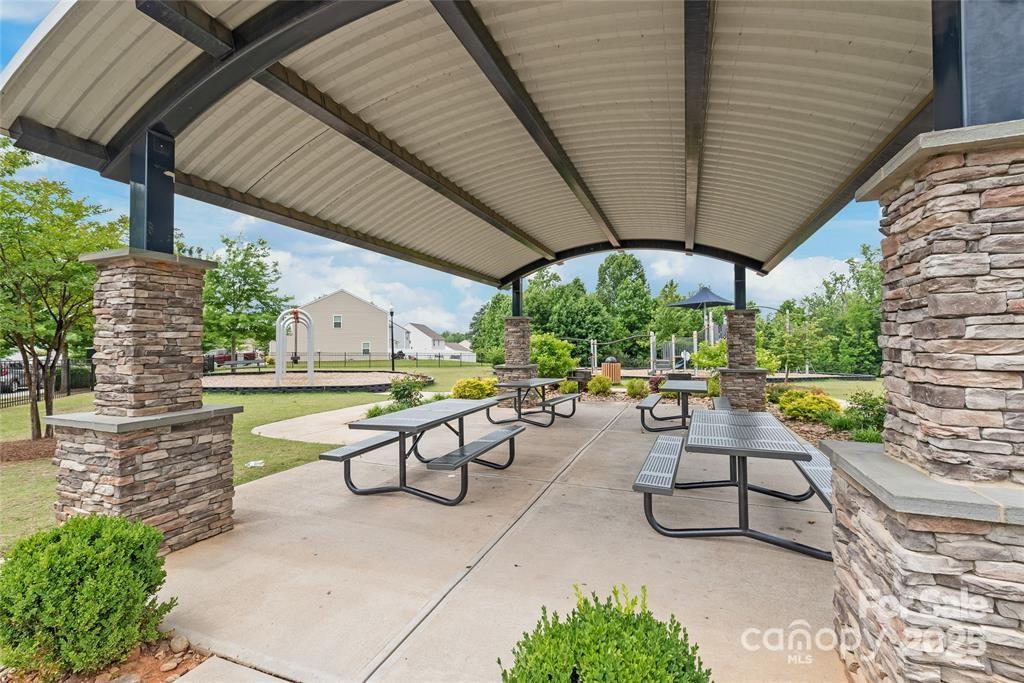 9740 Weikert Road Charlotte, NC 28215 - Photo 16 of 16 a view of swimming pool with outdoor seating