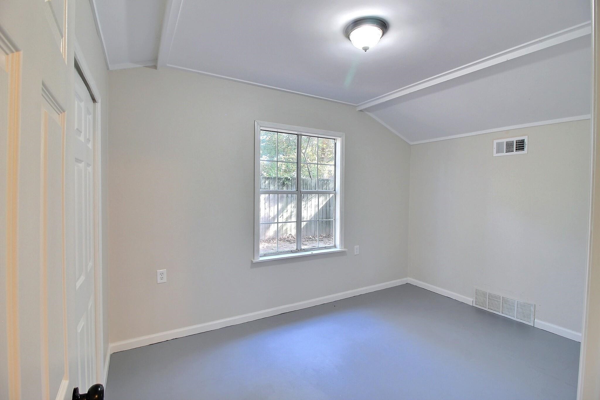 4528 Quince Road Memphis, TN 38117 - Photo 19 of 27 an empty room with a window