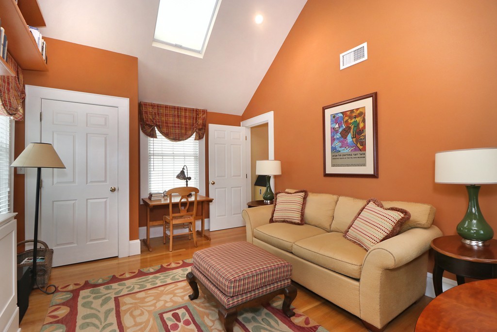 35 Shea Road Cambridge, MA 02140 - Photo 7 of 12 a living room with furniture a rug and a lamp