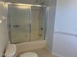 1430 Delbrook Way Marco Island, FL 34145 - Photo 11 of 18 a bathroom with a shower and toilet