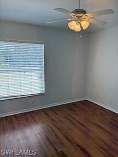 1430 Delbrook Way Marco Island, FL 34145 - Photo 12 of 18 a view of a room with a large window and wooden floor