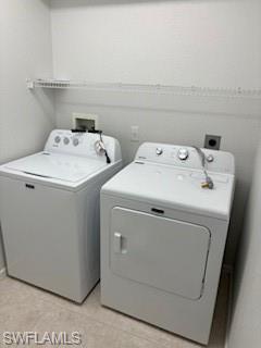 1430 Delbrook Way Marco Island, FL 34145 - Photo 15 of 18 a utility room with dryer and washer