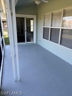 1430 Delbrook Way Marco Island, FL 34145 - Photo 16 of 18 view of an empty room with wooden floor and a window