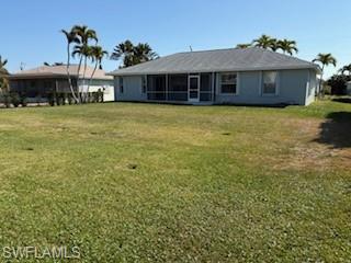 1430 Delbrook Way Marco Island, FL 34145 - Photo 17 of 18 a view of a house with a yard