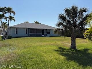 1430 Delbrook Way Marco Island, FL 34145 - Photo 18 of 18 a view of a house with a yard