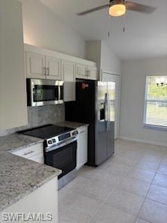1430 Delbrook Way Marco Island, FL 34145 - Photo 7 of 18 a kitchen with stainless steel appliances granite countertop a refrigerator stove and sink