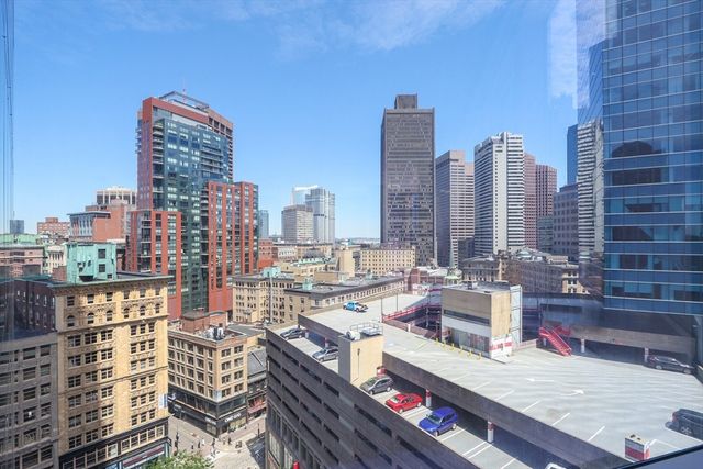 a view of city with tall buildings