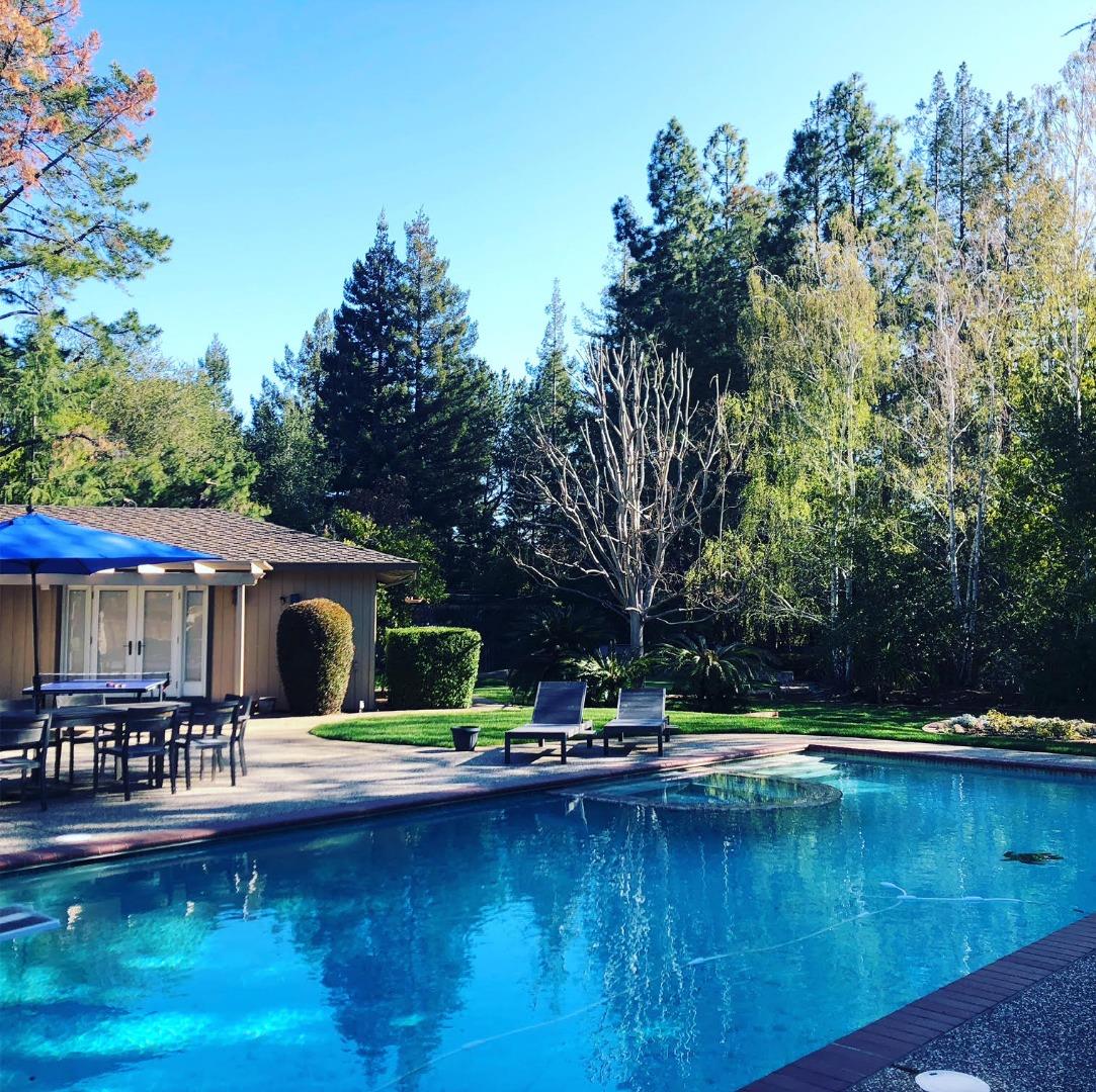 14072 Okanogan Drive Saratoga, CA 95070 - Photo 2 of 7 a view of swimming pool with seating space and trees in the background