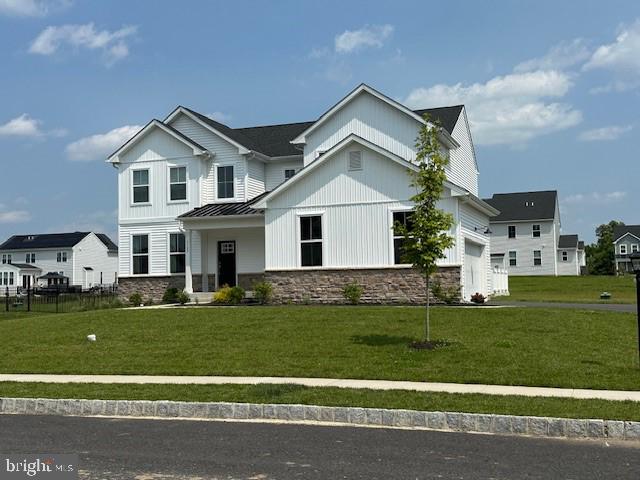 1142 Mariwill Drive Quakertown, PA 18951 - Photo 2 of 44 a front view of a house with a yard