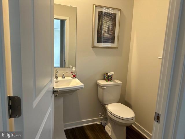 1142 Mariwill Drive Quakertown, PA 18951 - Photo 24 of 44 a bathroom with a toilet sink and mirror