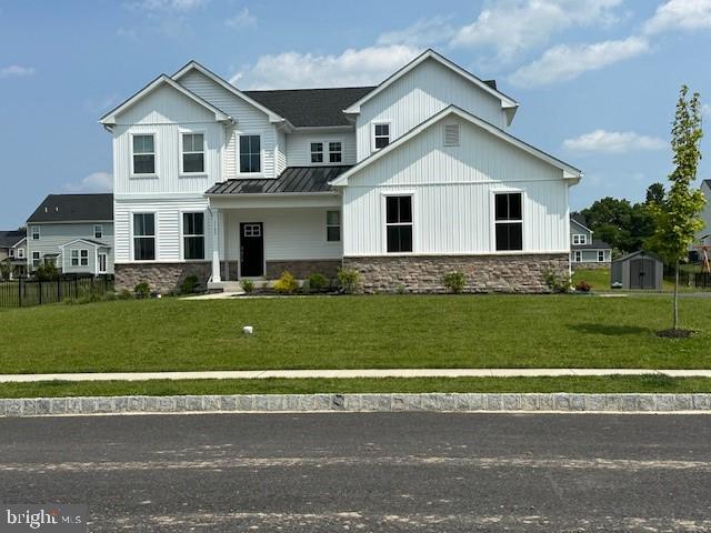 1142 Mariwill Drive Quakertown, PA 18951 - Photo 3 of 44 a front view of a house with a yard