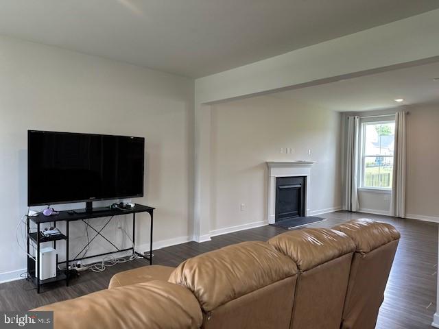 1142 Mariwill Drive Quakertown, PA 18951 - Photo 9 of 44 a living room with a flat screen tv and a fireplace