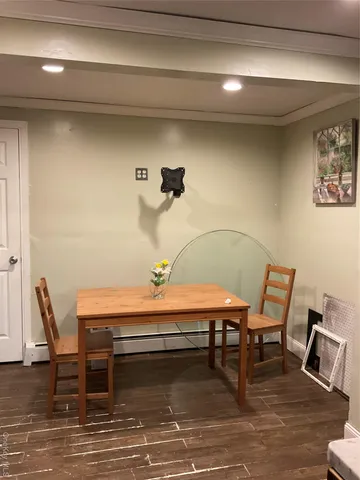 a room with a table and chairs