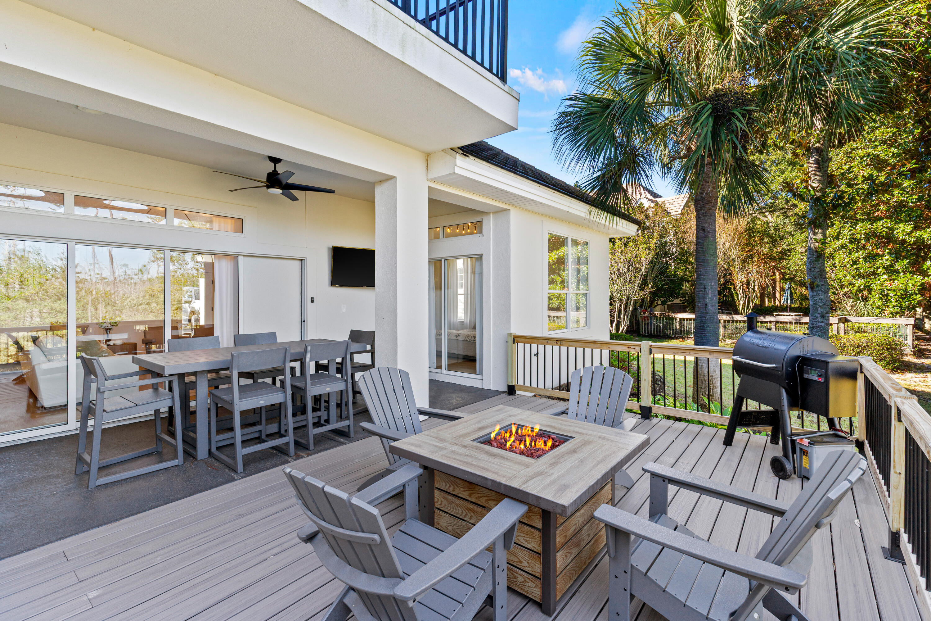 4591 Sailmaker Lane Destin, FL 32541 - Photo 30 of 41 a outdoor space with furniture and wooden floor