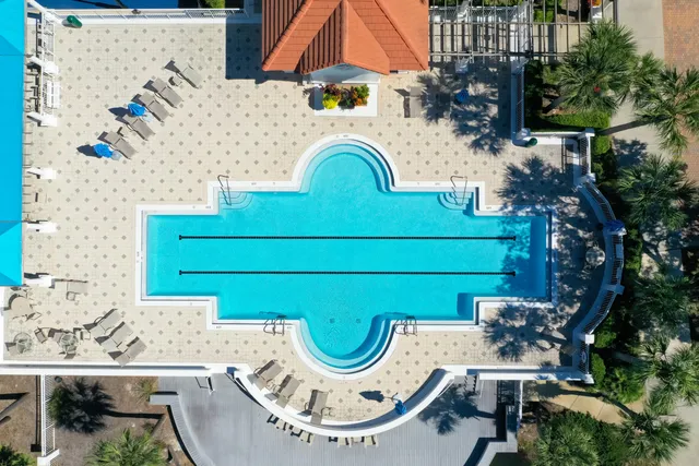 an aerial view of a house with outdoor space
