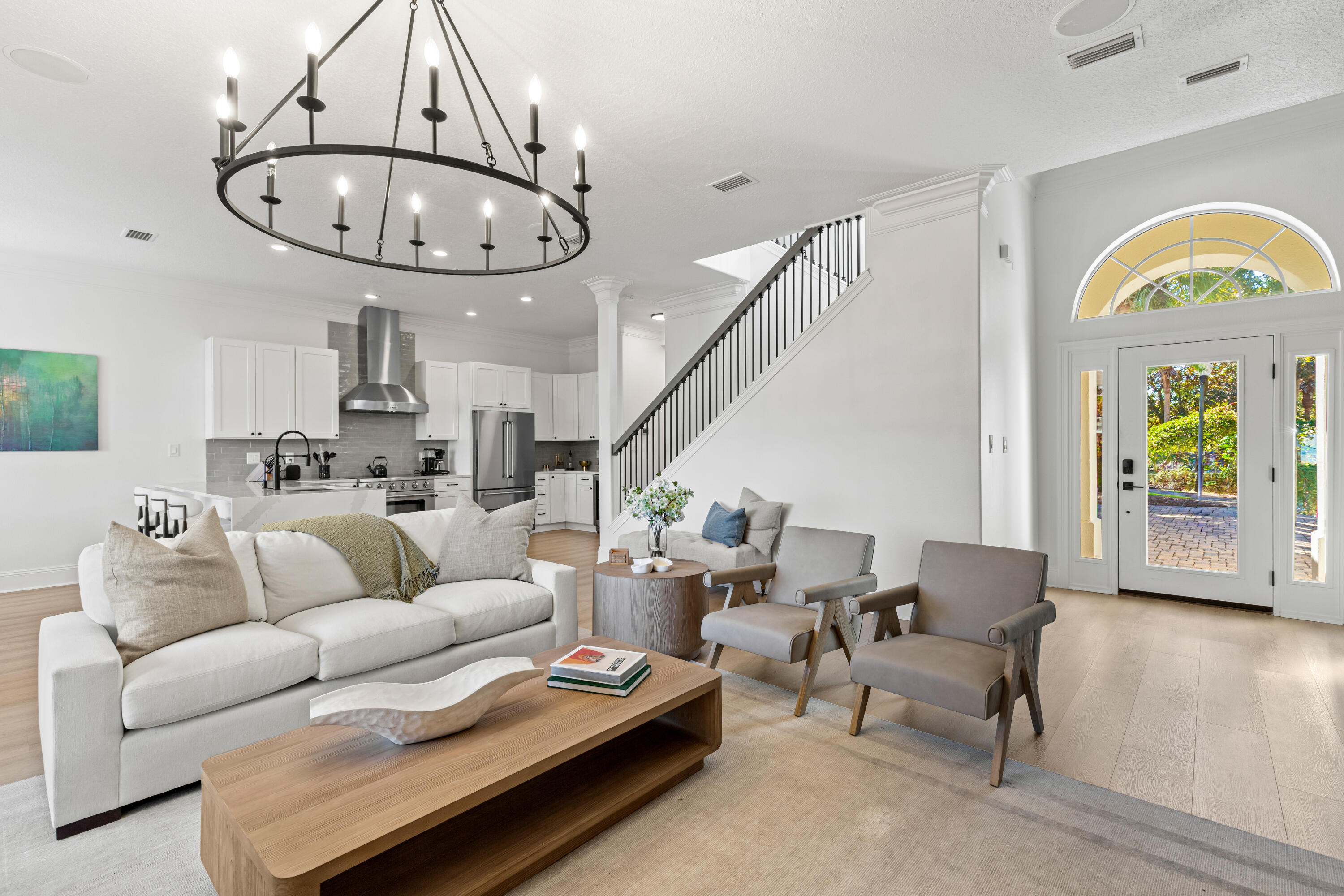 4591 Sailmaker Lane Destin, FL 32541 - Photo 5 of 41 a living room with furniture chandelier and a table