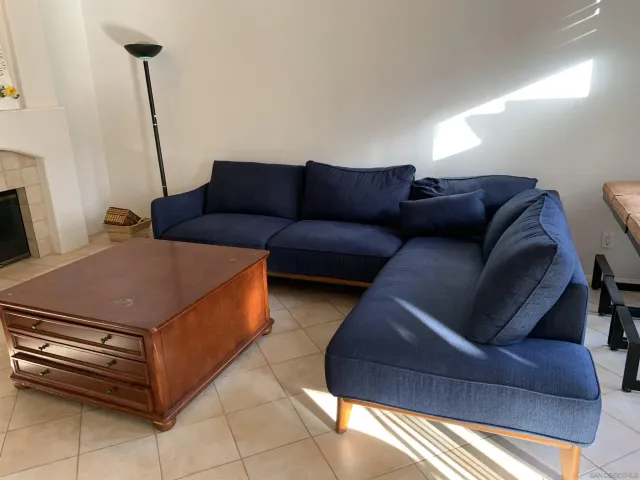 a living room with furniture and a couch