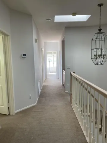 a view of livingroom with hallway